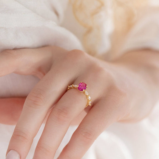 Oval cut pink Sapphire pave ring